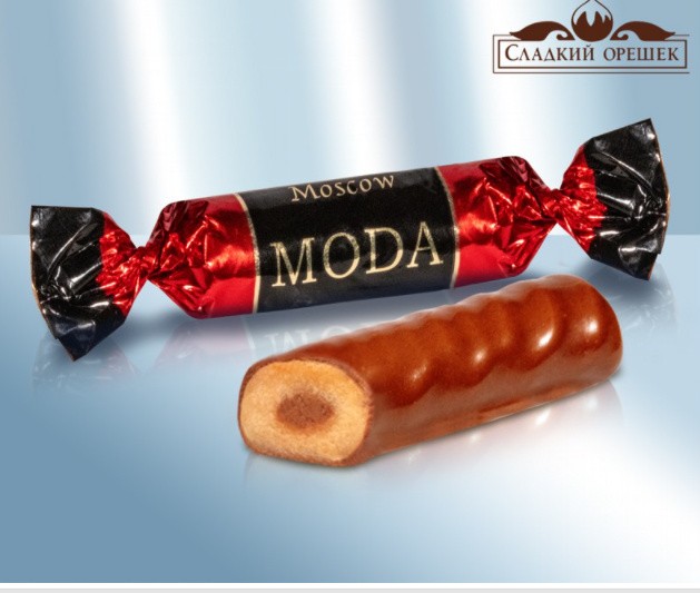 Шоколадная Конфета "MODA Moscow" с насыщенным арахисовым вкусом в сочетании с молочной начинкой, покрытая превосходной глазурью с какао